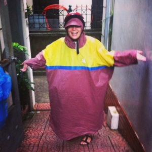 Poncho and bike helmet - It's a strong look